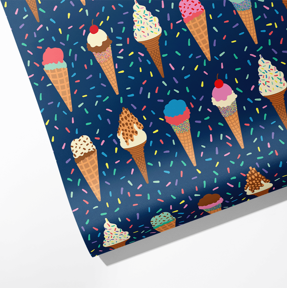 Wrapping paper roll -- dark blue background with colorful confetti sprinkles on it along with rows of various ice cream cones 