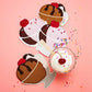 ice cream sundae shaped cocktail napkins with cherries and sprinkles on a pink background