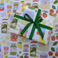 single sheet of gift wrap designed with a variety of popular Italian ingredients including pasta, tomatoes, olives, garlic, pesto, basil, etc. 