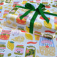 single sheet of gift wrap designed with a variety of popular Italian ingredients including pasta, tomatoes, olives, garlic, pesto, basil, etc. 