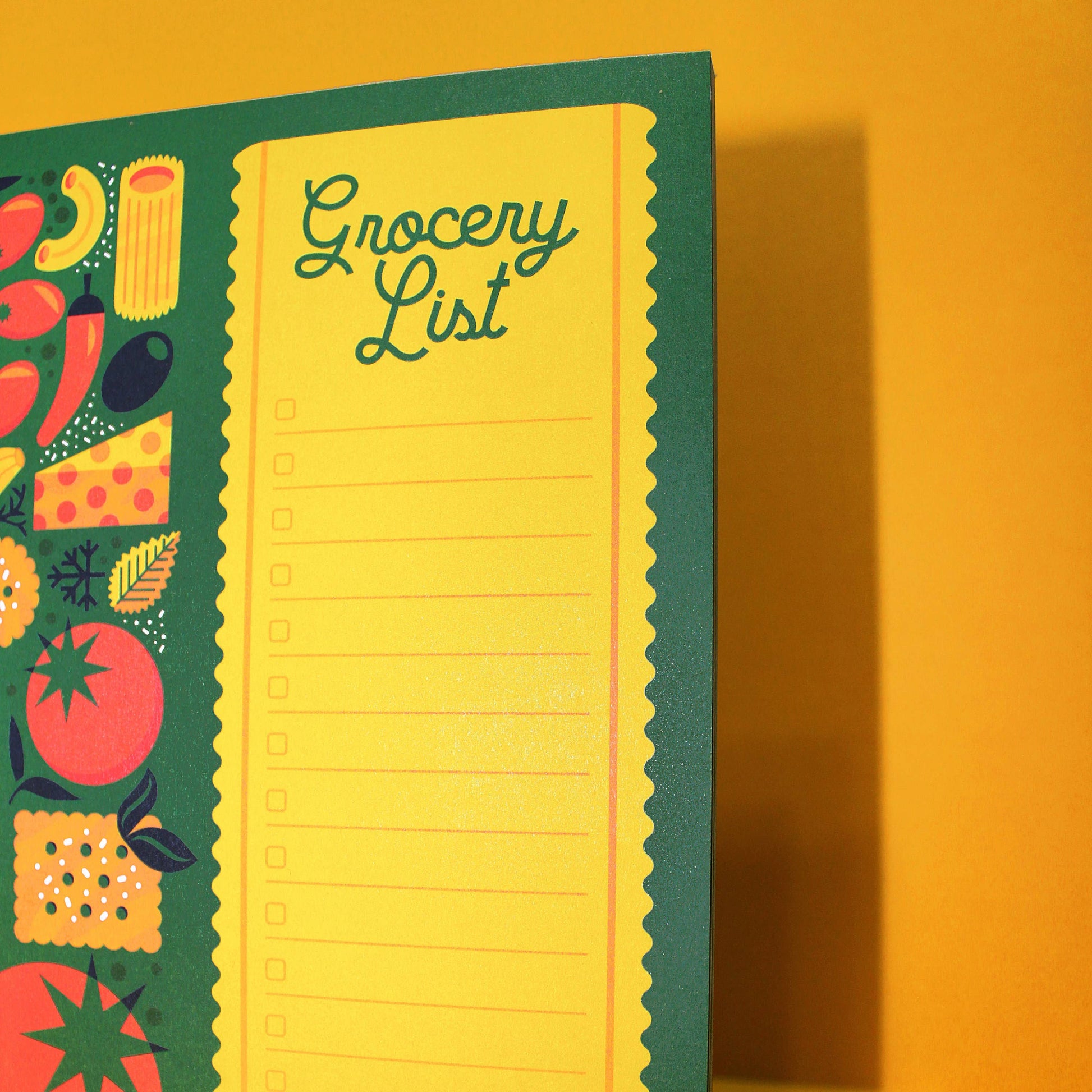 Italian themed grocery list notepad featuring various italian food ingredients including olives, tomatoes, pasta, cheese, crackers, peppers and herbs