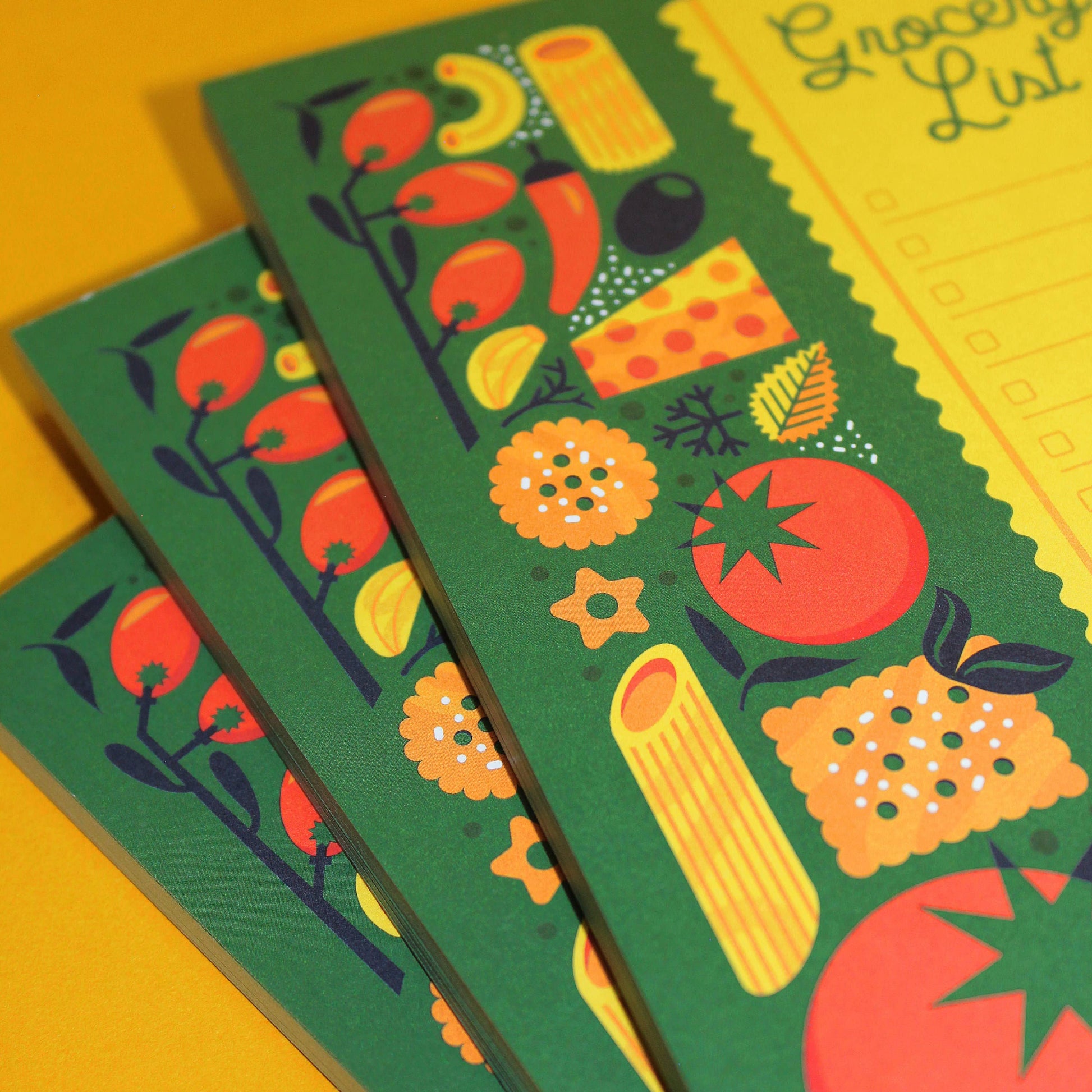 Italian themed grocery list notepad featuring various italian food ingredients including olives, tomatoes, pasta, cheese, crackers, peppers and herbs
