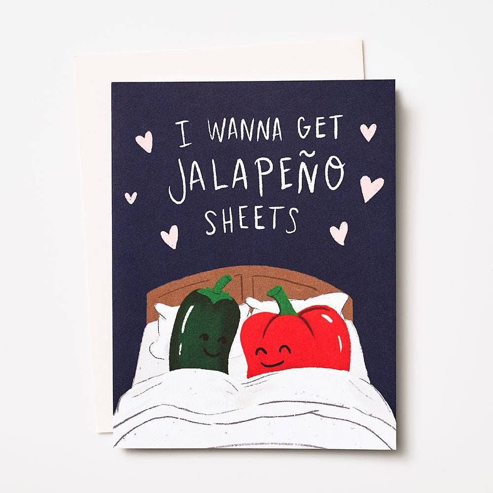 Card with jalapeño peppers in bed and text 'I Wanna Get Jalapeño Sheets' on a white background