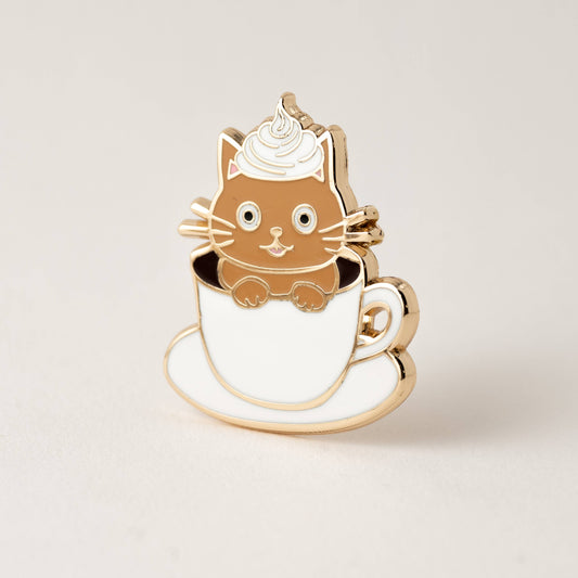 Cat-shaped coffee pin on a white background