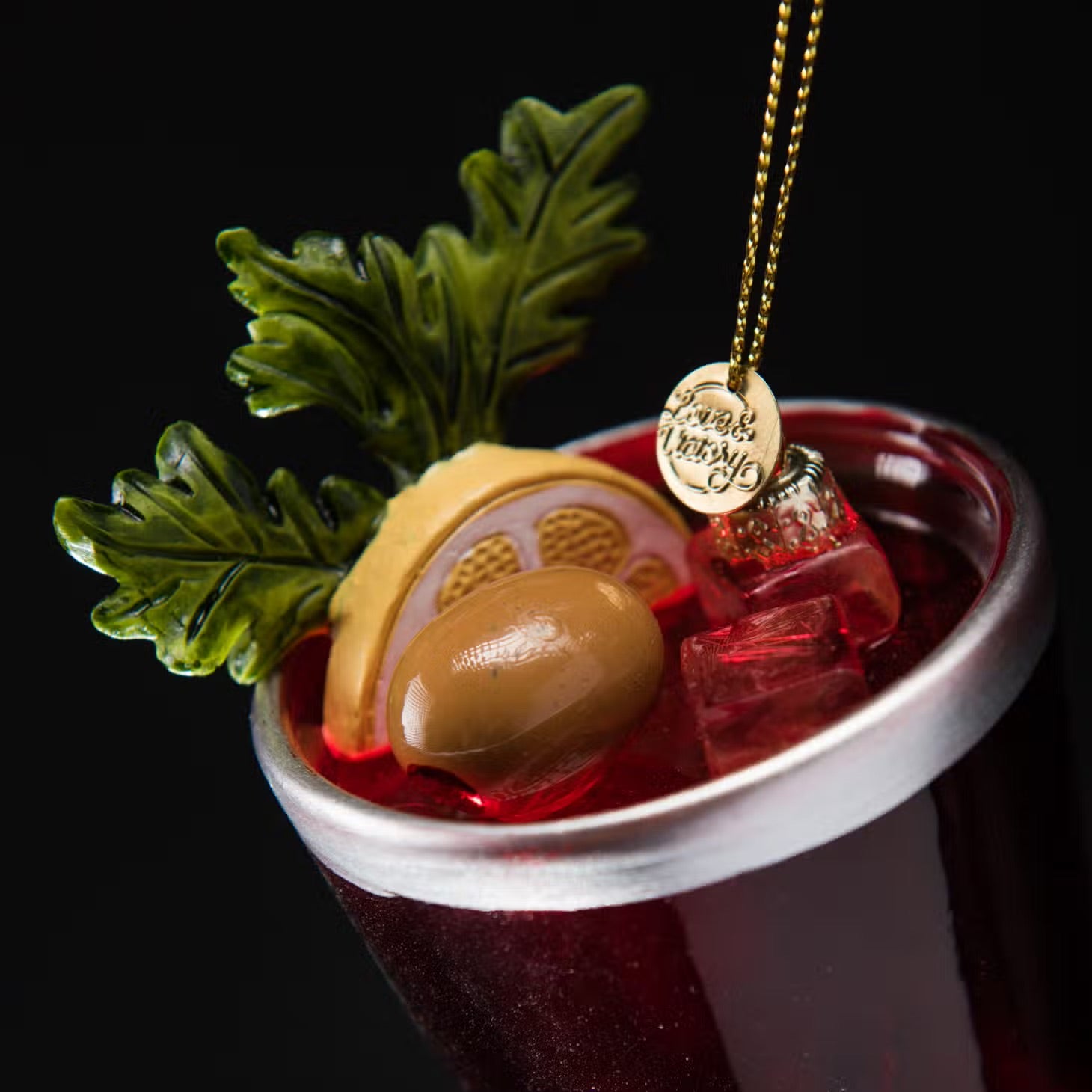 Handblown glass Christmas ornament of a bloody mary cocktail