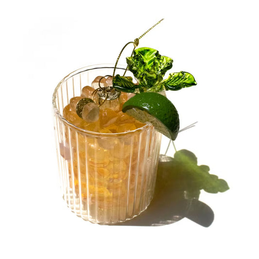Mai Tai ornament with crushed ice, mint and lime wedge.