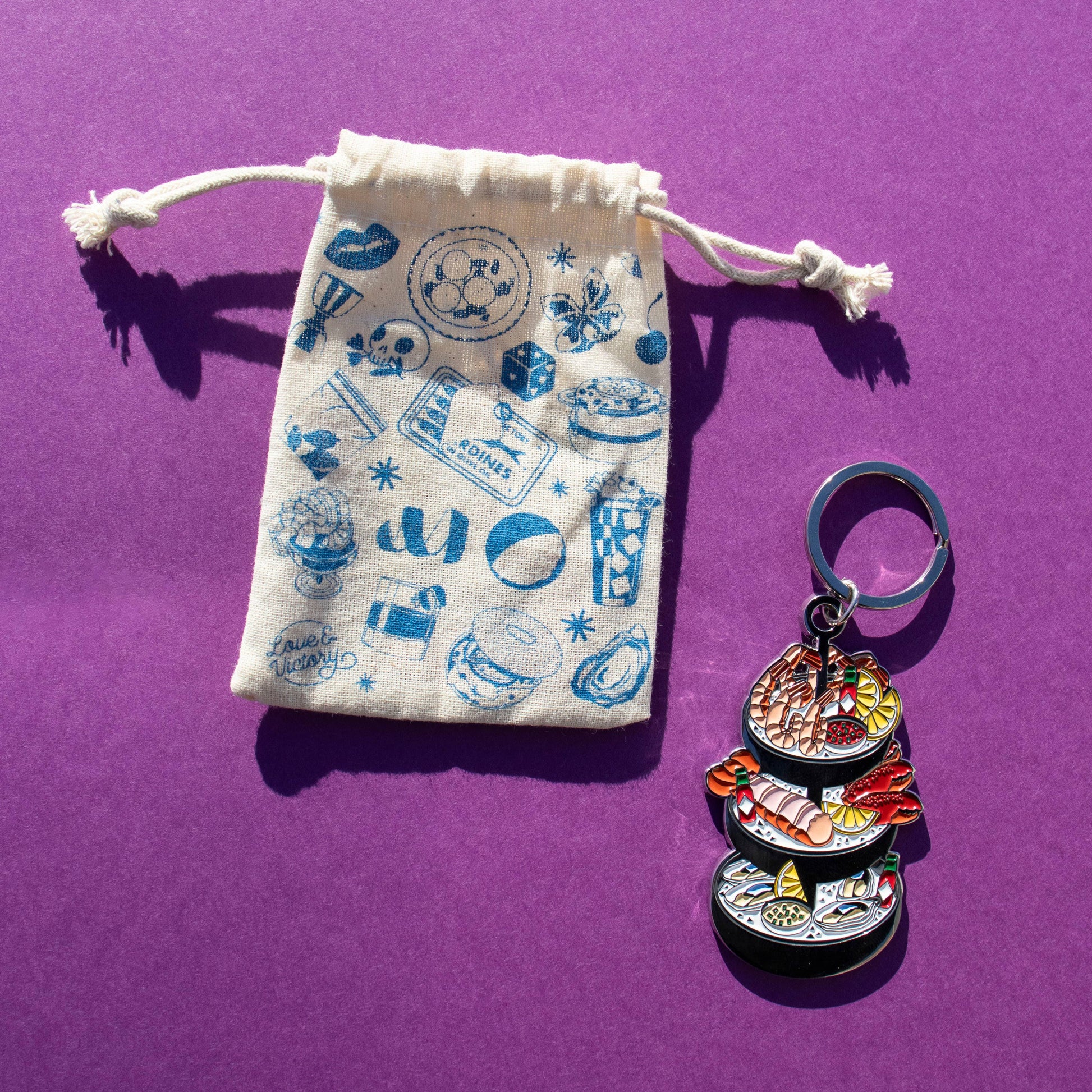 Seafood tower keychain with printed canvas pouch 