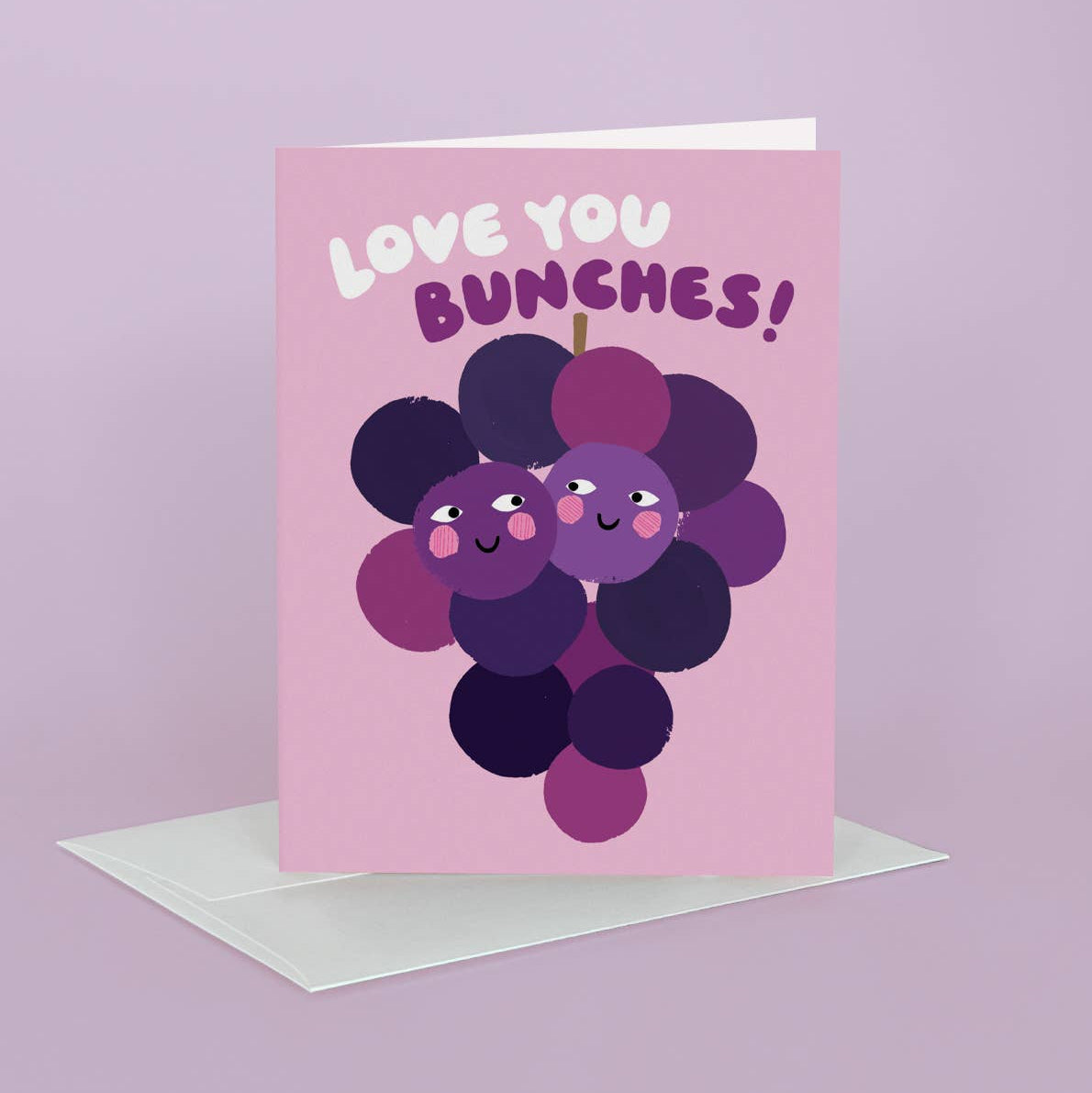 greeting card with an illustrated bunch of purple grapes and text above that reads "love you bunches" 