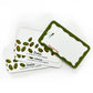 Set of stationery items with green and red design on a white background