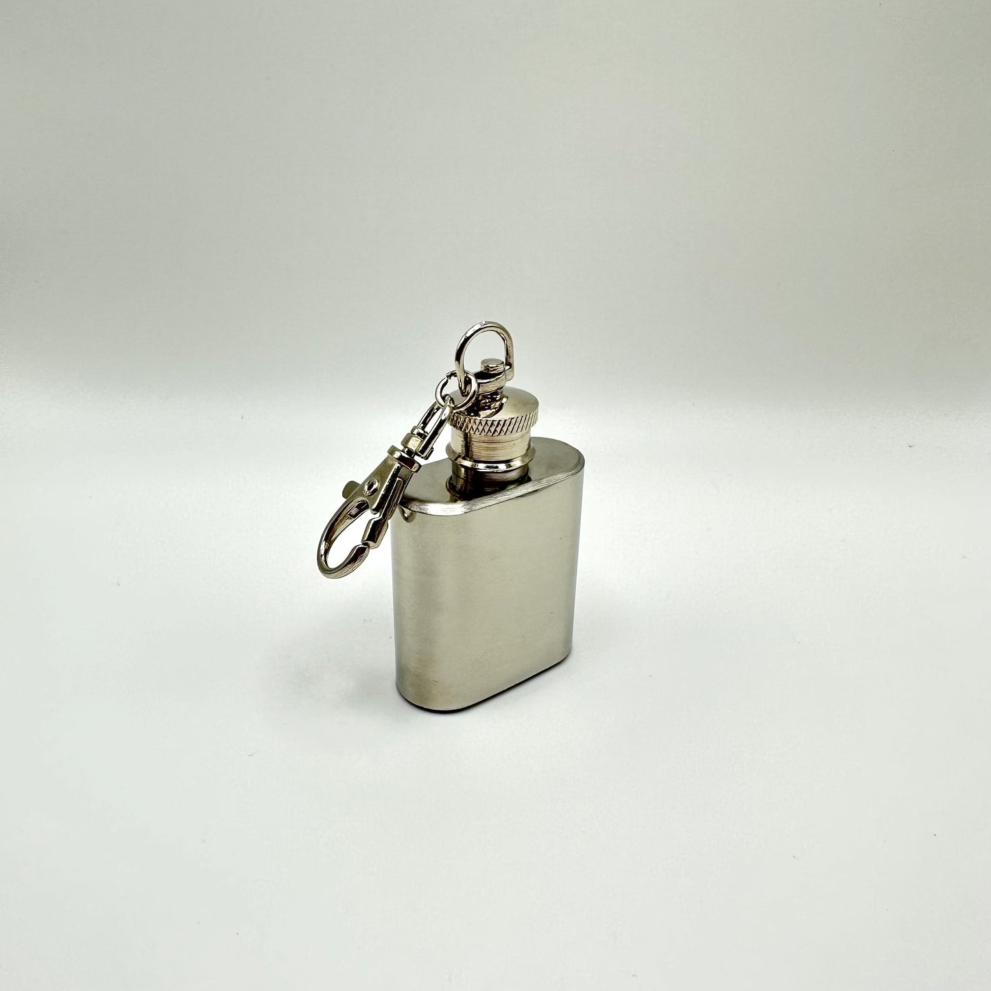 Mini stainless steel keychain flask.