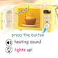 Yellow toy microwave with a cupcake inside, featuring text and icons indicating features.