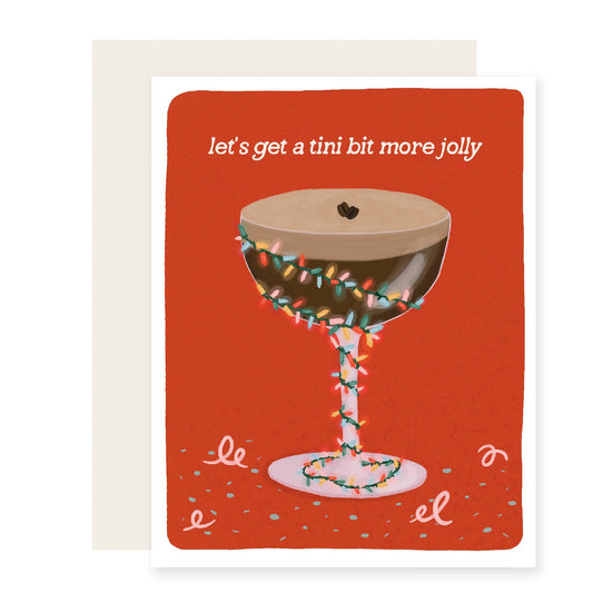 Greeting card with a festive espresso martini cocktail illustration and text that reads "let's get a tini bit more jolly" on a red background