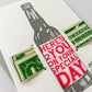 Card with bottle graphic and text 'Here's 2 you on your special day' on a white background