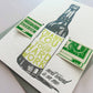 Greeting card with beer bottle design and text on a white background
