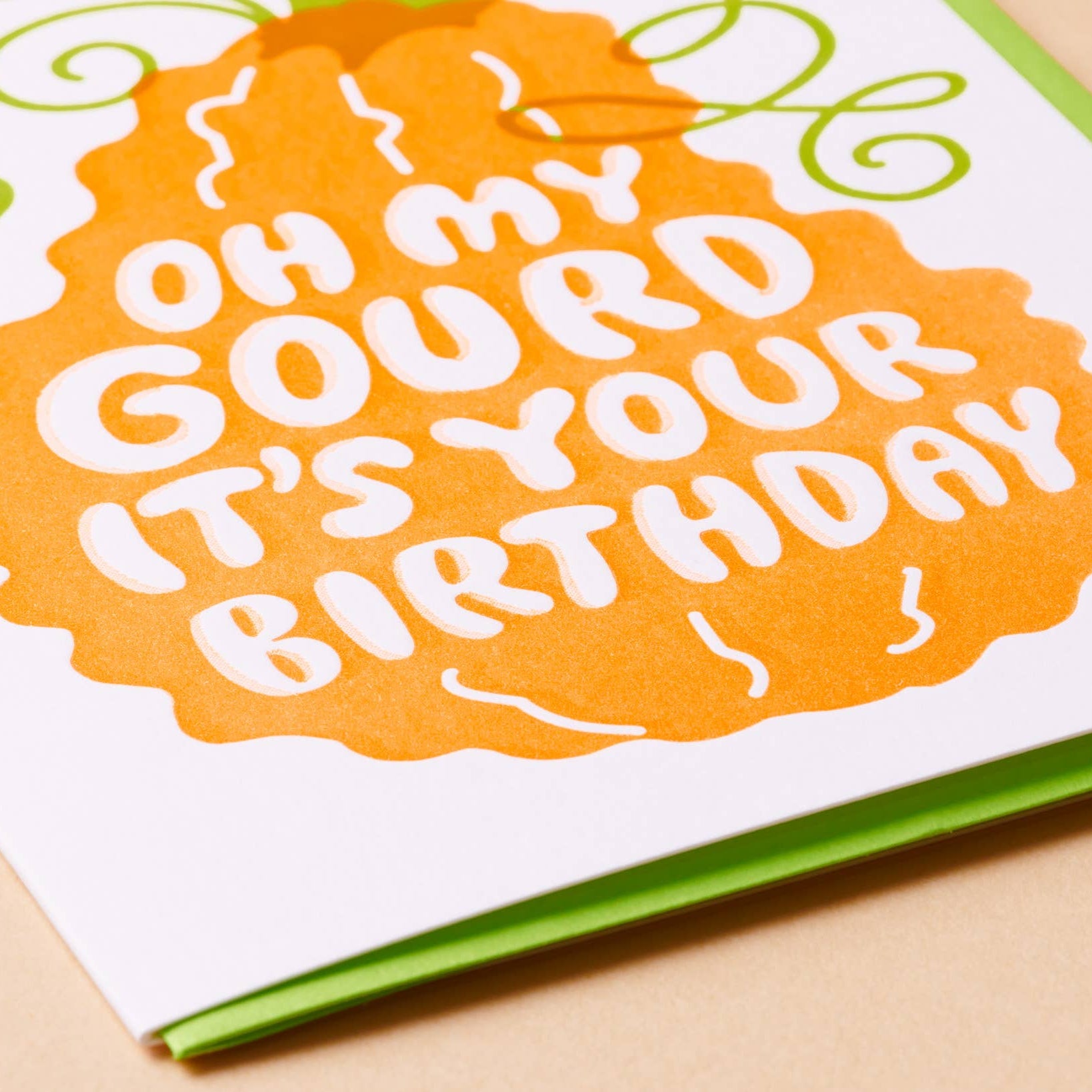 Birthday card with 'Oh my gourd it's your birthday' text on an orange background