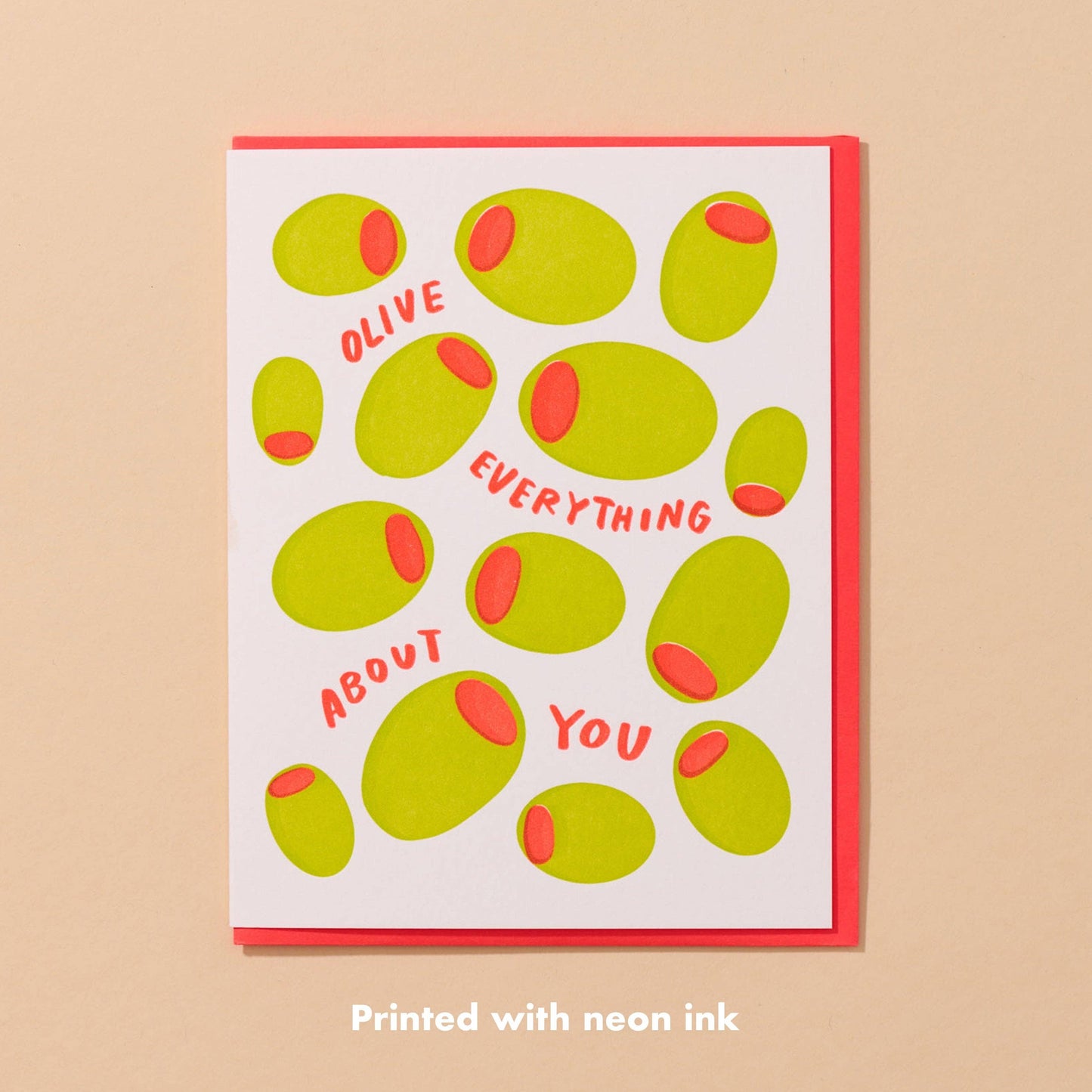 greeting card with several stuffed green olives on it and text that reads "olive everything about you". Comes with red envelope. 