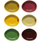 Set of six colorful ceramic dishes on a white background