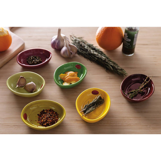 Colorful bowls with various ingredients on a wooden surface