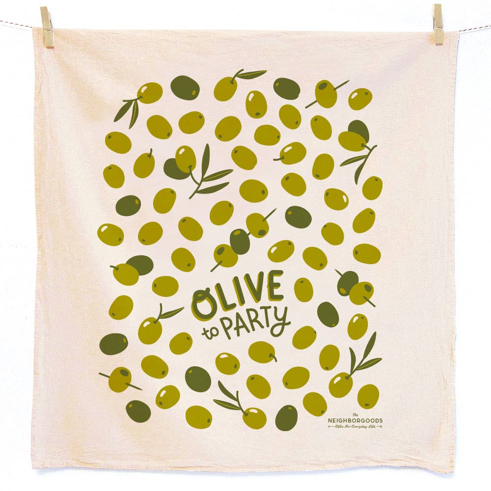 light colored kitchen towel designed with green olives all over. Text towards bottom center reads "olive to party" 