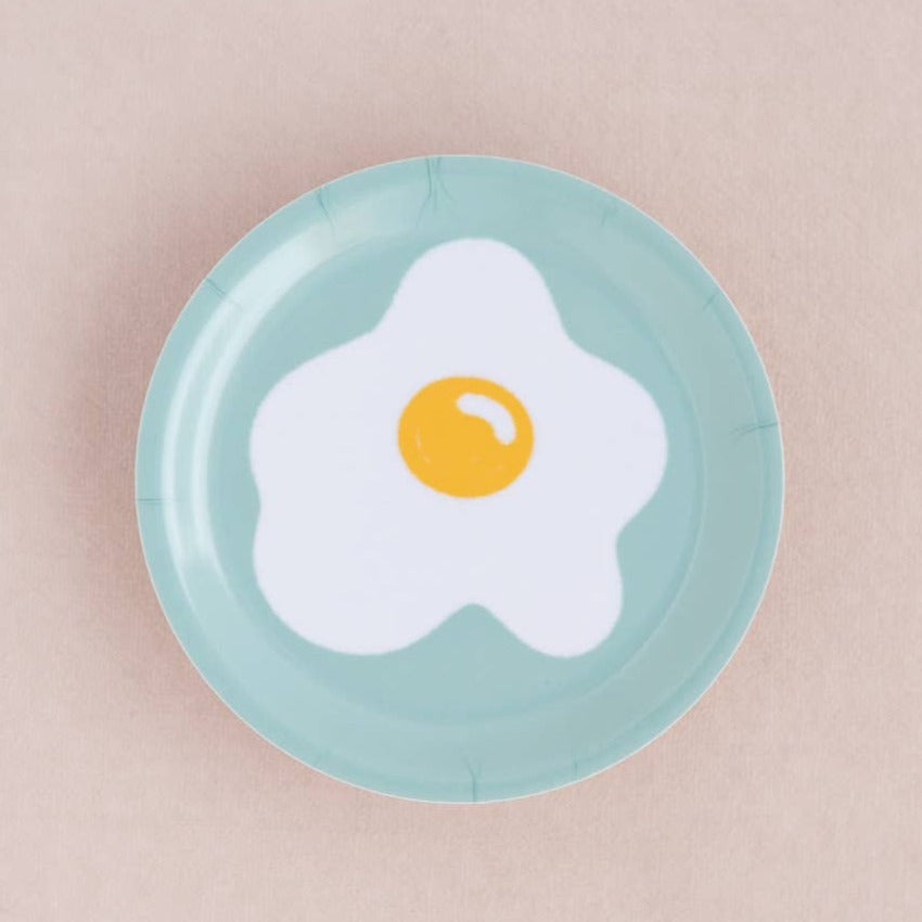 Egg trinket dish. Sunny side up egg on a aqua background.