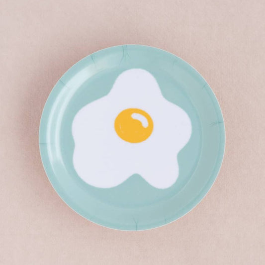 Egg trinket dish. Sunny side up egg on a aqua background.