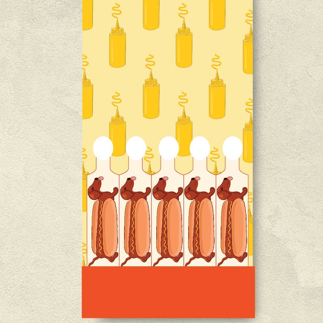 matches designed with a wiener-dog inside a hot dog bun and mustard squeeze bottles on the interior flap