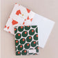 lined notebook featuring a stuffed olive design/pattern on the outside 