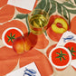 tomato coasters on tablescape 