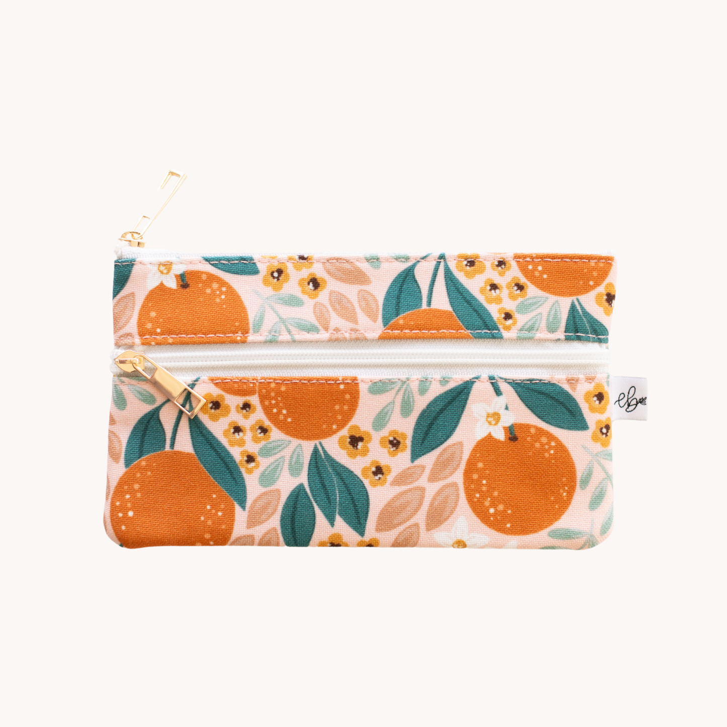 zipper pencil pouch with an orange design by elyse breanne design 