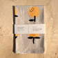 Linen tea towel with oranges screen printed on it 