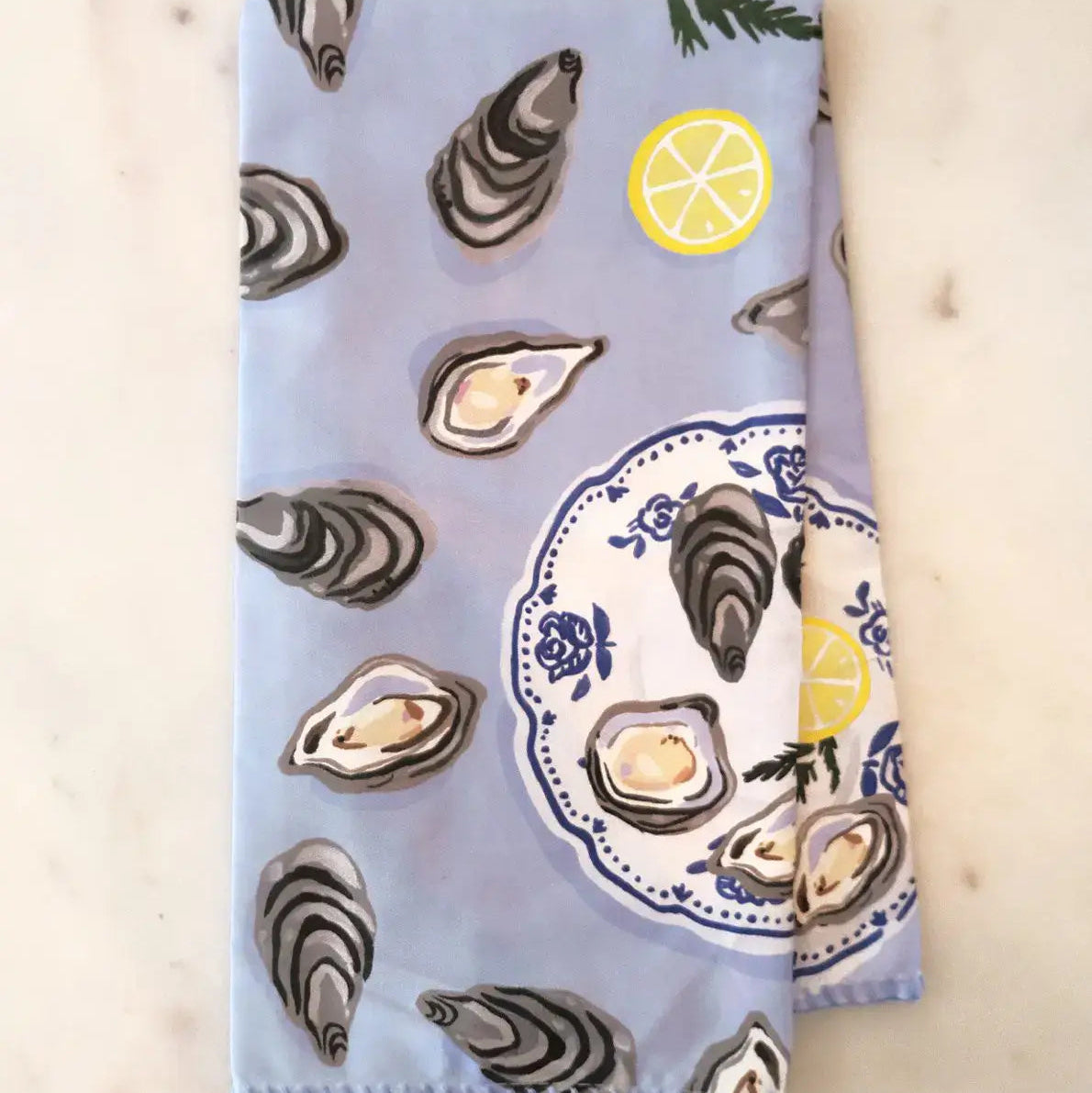 oysters and lemon design blue cotton tea towel 