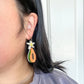 Papaya dangle earrings for scale 
