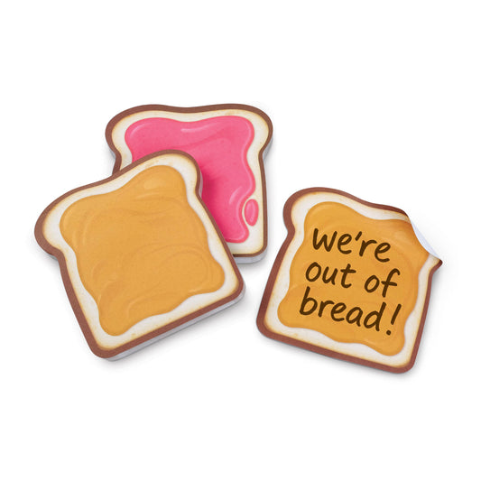 Two bread-shaped sticky notes with pink jelly and one with peanut butter and 'We're out of bread!' text on a white background