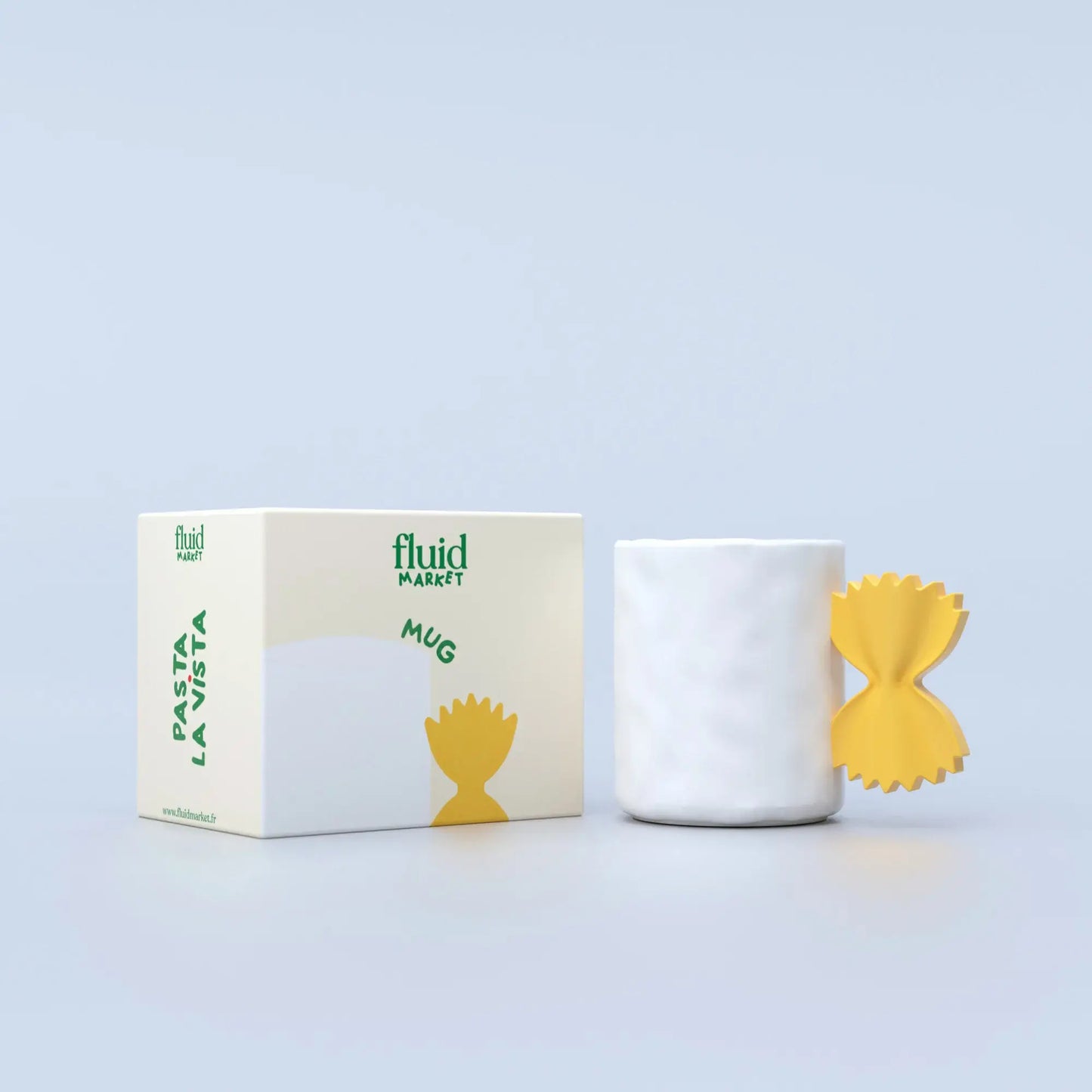 white, ceramic mug with a yellow handle shaped like farfalle pasta next to it's box packaging 