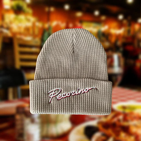 gray knit beanie with "Pecorino" stitched across the front band/fold