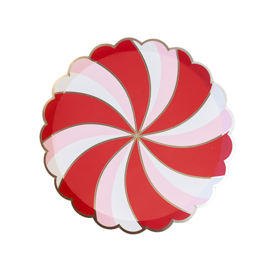 Red and white swirled peppermint candy paper plate on a white background