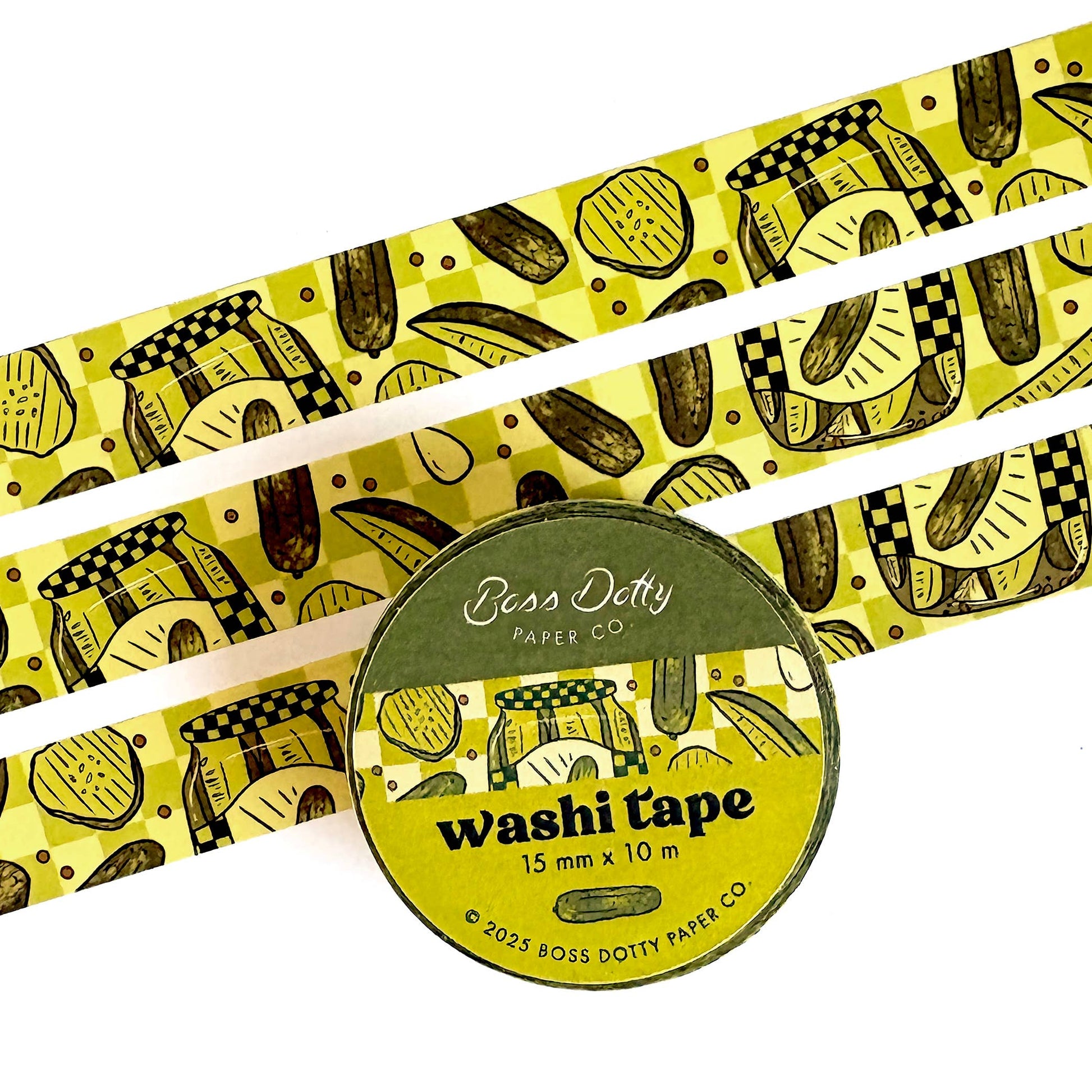 Washi tape that features a repeating pattern of pickle jars, pickle slices and spears in a green checkerboard motif