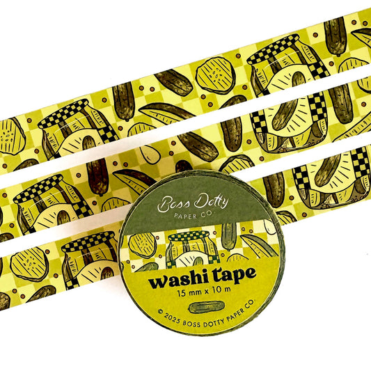 Washi tape that features a repeating pattern of pickle jars, pickle slices and spears in a green checkerboard motif