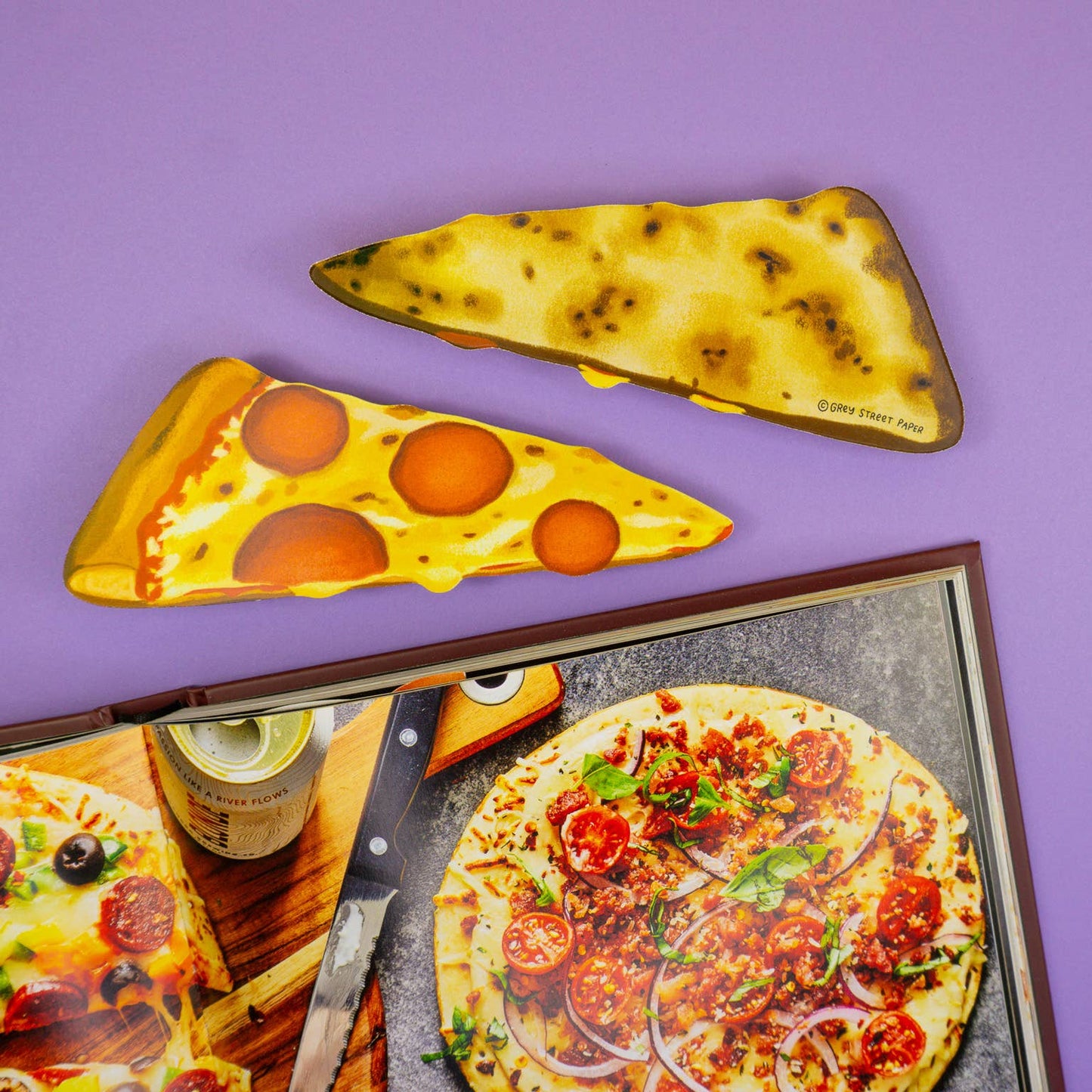Bookmarks that look like pizza slices against a purple background