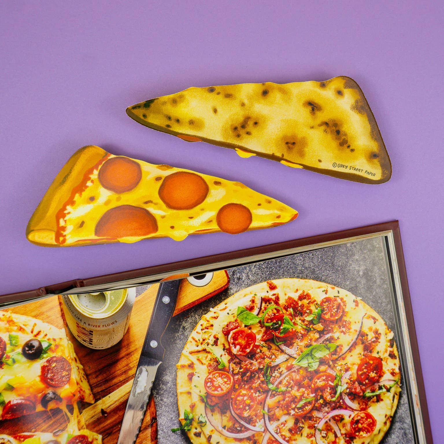 Bookmarks that look like pizza slices against a purple background