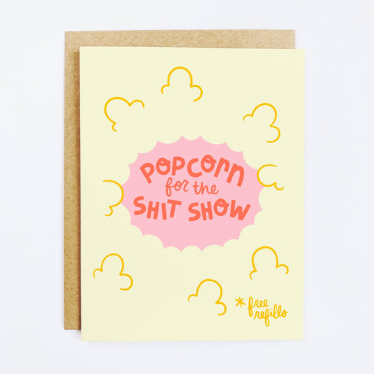 Greeting card with 'Popcorn for the Shit Show' text on a yellow background
