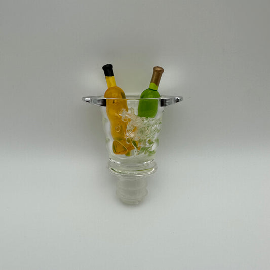 Bottle stoppers designed with an acrylic wine chiller filled with ice and two bottles of wine