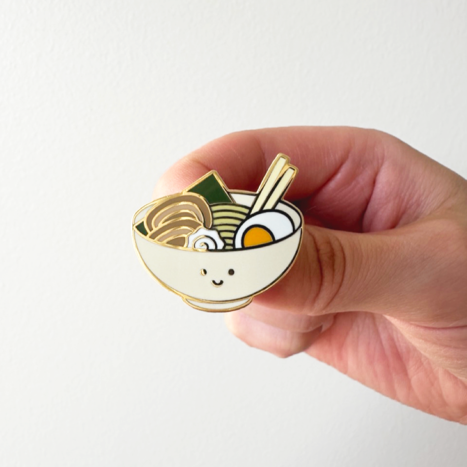 smiley faced ramen bowl enamel pin 