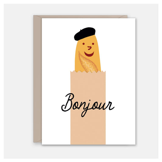 Greeting card with a smiley baguette wearing a beret on it. Text reads "bonjour" 