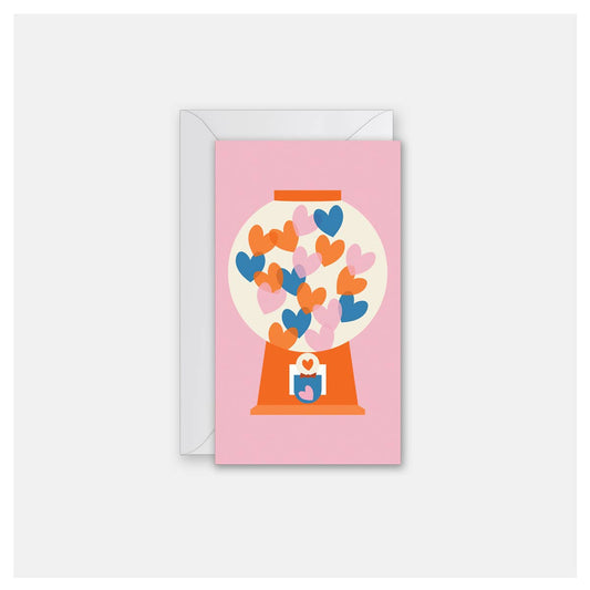 mini greeting card with a gumball machine printed on it and heart shaped gumballs inside