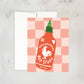 Valentine's Day card with a hot sauce bottle design on a checkered background