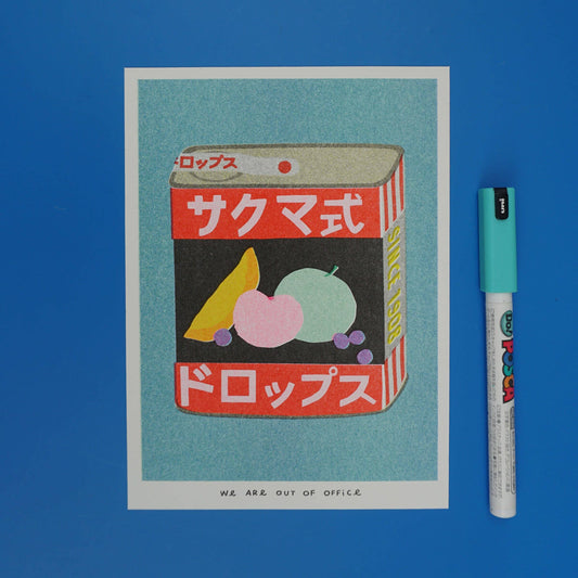 Vintage-style product packaging illustration of Sakuma Drops, with Japanese text on a blue background, accompanied by a marker for scale.