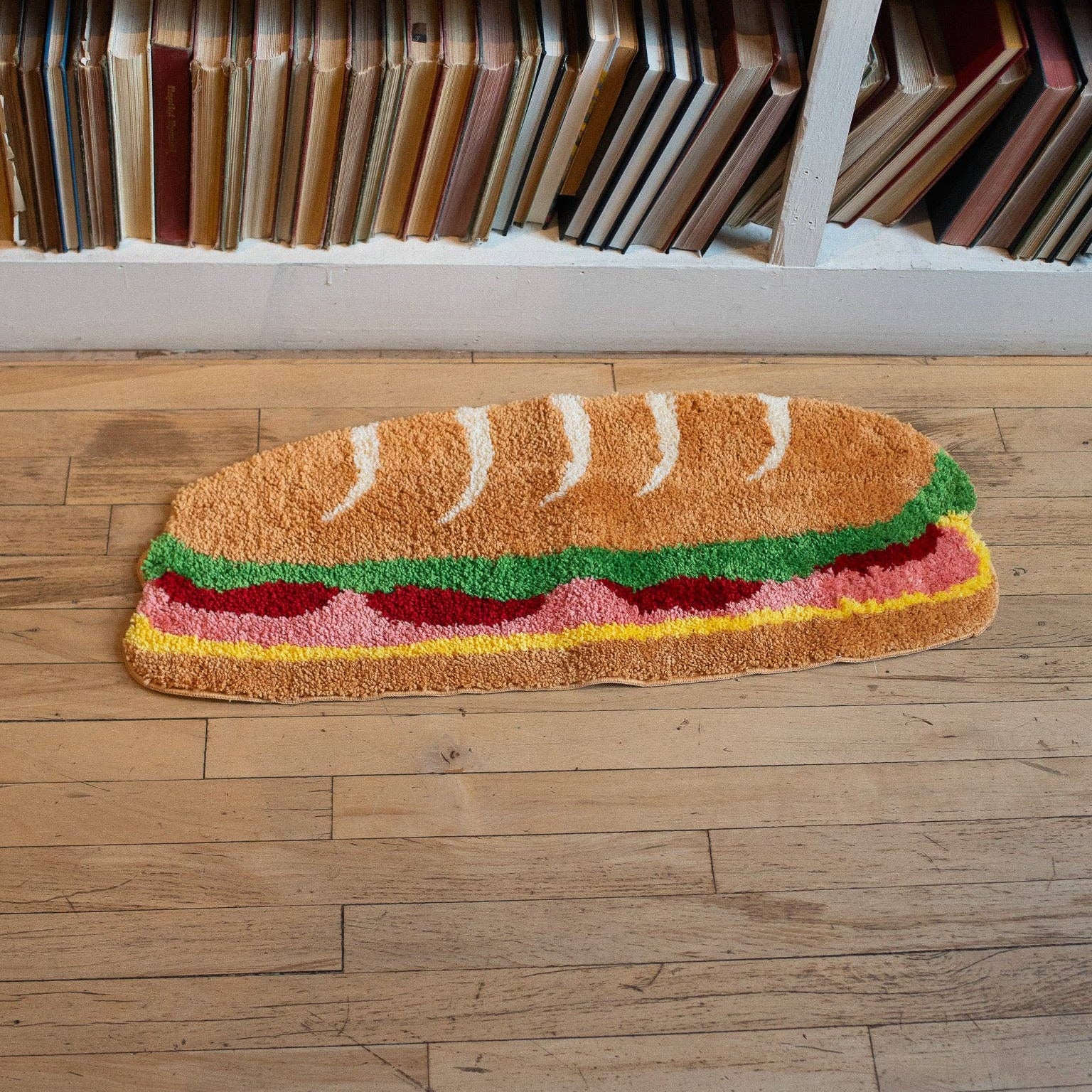 sandwich shaped rug on floor 