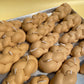 A sheet pan full of challah bread.