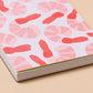 close up of details on shrimp pocket notebook 